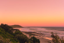 The Pinky Sunset In Summer Time On The Beach In Ballina With Ocean View And Hilly Landscape, Byron Bay, Australia