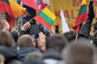 Man Hand Hold Lithuanian Flag