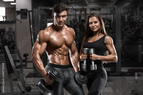 Sporty Sexy Couple Showing Muscle And Workout In Gym Muscular Man