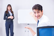 © Elnur - Business presentation in the office with man and woman