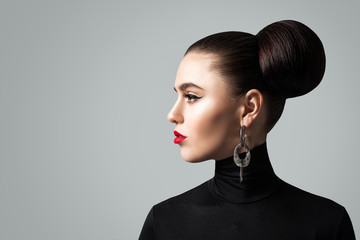 Pretty Young Woman with Hair Bun Hairstyle, Profile Portrait