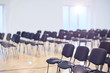 © pressmaster - Rows of empty chairs in contemporary conference hall or large auditorium