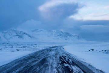 Wall Mural - Road trip on winter roads in Iceland