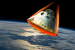 Reentry of space capsule into Earth's Atmosphere. - Elements of this image courtesy of NASA.