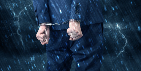 Stormy wallpaper with close handcuffed man