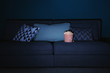 © Africa Studio - Comfortable couch with popcorn indoors. Home cinema