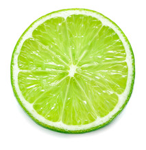 Close-up View Of Single Slice Of Lime Isolated On White Background
