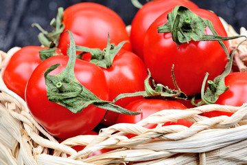 Canvas Print - Group of cherry tomatoes in a wicker