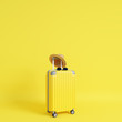 Leinwandbild Motiv Yellow suitcase with sun glasses and hat on yellow background. travel concept. minimal style