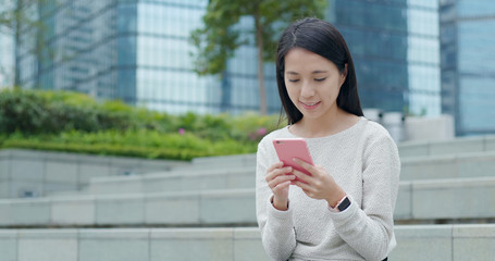 Poster - Woman use of smart phone at outdoor