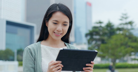 Poster - Asian woman use of tablet computer