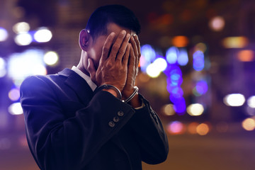 Wall Mural - Businessman in handcuffs