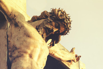 Jesus Christ in a crown of thorns, crucifixion. The concept of faith in God