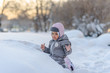 © lialia699 - Cute child playing with snow