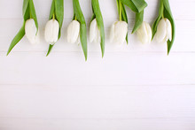 Bouquet Of White Tulips On A White Wooden Table, Copy Space. Easter.