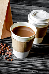 coffee cup take away at wooden background