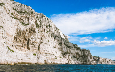 White cliffs of Massif des Calanques on sunny day in Cassis, France