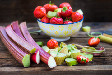 Wall Mural - Pieces of Raw and Fresh Cut Rhubarb and Strawberries