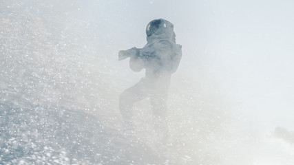 Wall Mural - Proud Astronaut Confidently Explores Alien Planet's Surface During the Blizzard. Cold Planet Covered in Gas and rock,  People Overcoming Difficulties, Important Moment for the Human Race.