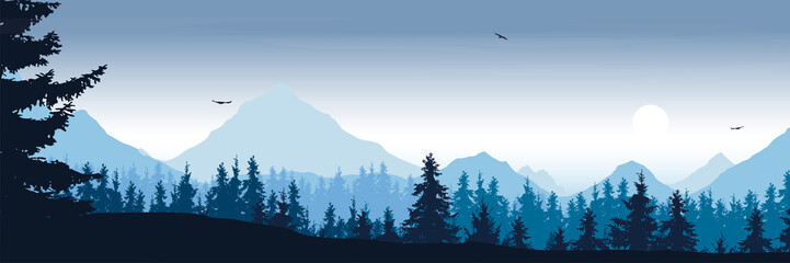 wide mountain landscape with forest and flying birds under the morning sky with clouds and rising su