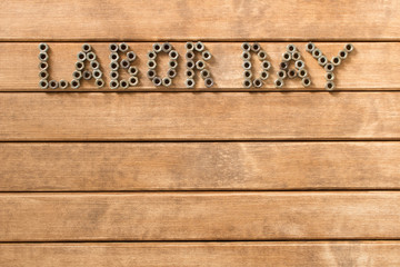 Wall Mural - Labor day.  Different tools on a wooden table