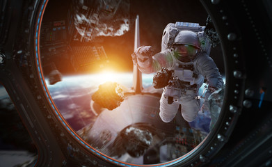 Wall Mural - astronaut working on a space station 3d rendering elements of this image furnished by nasa