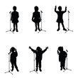 © dramaj - child with microphone singing black silhouette