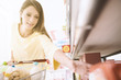 © stokkete - Woman shopping at the supermarket