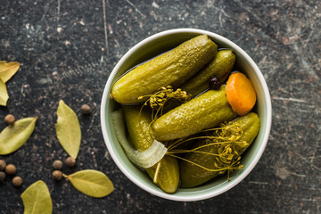 Poster - Pickles in bowl. Preserved cucumbers.