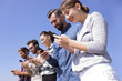 © ASDF - young people using smartphones to search network