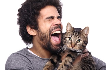 Afro man with a cat