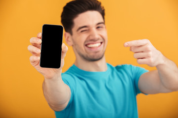 Canvas Print - Close up portrait of a smiling young man in t-shirt