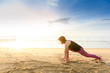 © TinPong - Woman yoga on the beach