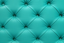 Turquoise Leather Sofa Stitched Buttons.