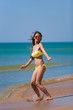 © erainbow - yellow bikini sea, jumping