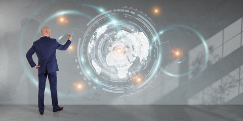 Poster - Businessman using digital planet earth interface on a wall 3D rendering