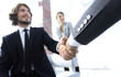 © ASDF - Closeup of a business hand shake