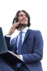 Wall Mural - closeup.successful businessman talking on the phone