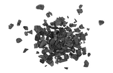 Black coal pile isolated on white background, top view