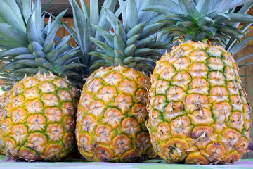 Wall Mural - Pineapple on display in Rarotonga market Cook Islands