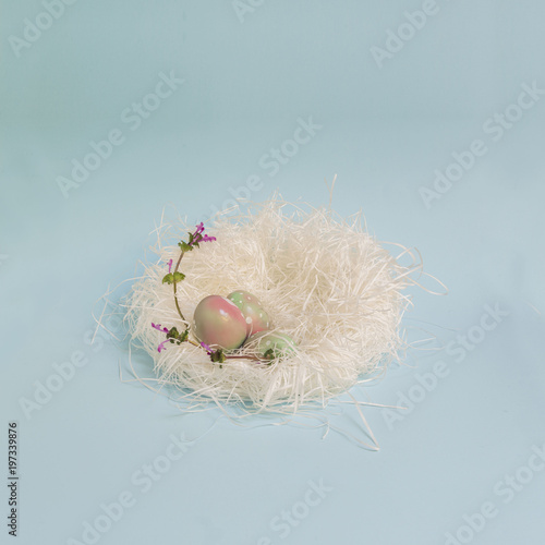 Easter Eggs On White Straw Nest Delicate Pastel Color Still Life