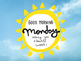 Good morning Monday wishing you a beautiful week word and sun shape on blue sky