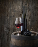 Fototapeta  - still life with red wine on old wood background