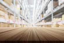 Wood Plank Table Top With Warehouse Store Blur Background For Your Product