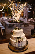 A Wedding Cake and A Dreamy Outdoor Dinner Setting