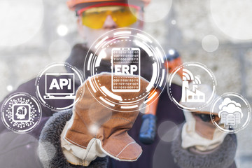Manufacturing engineer pressing ERP smartphone button on a virtual screen. Mobile Enterprise Resource Planning Smart Industry 4.0 concept.