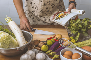 Man wearing a kitchen apron