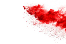 Red Powder Explosion On White Background. Colored Cloud. Colorful Dust Explode. Paint Holi.