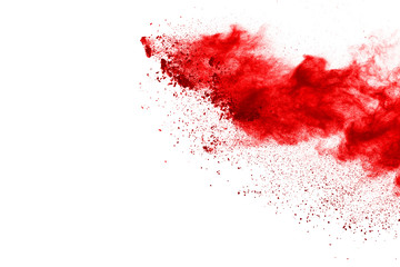 Wall Mural - red powder explosion on white background. colored cloud. colorful dust explode. paint holi.