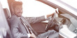 © ASDF - Handsome businessman in the drivers seat in his car